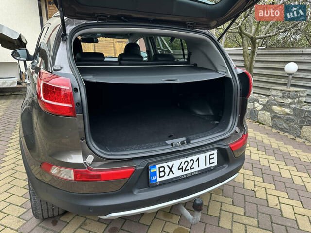 Коричневий Кіа Sportage, об'ємом двигуна 2 л та пробігом 197 тис. км за 14800 $, фото 27 на Automoto.ua