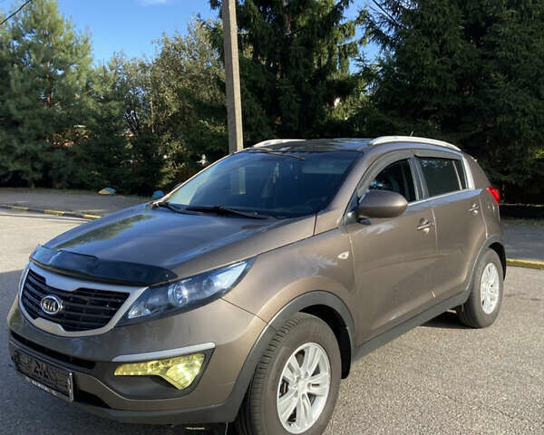 Коричневий Кіа Sportage, об'ємом двигуна 2 л та пробігом 173 тис. км за 11666 $, фото 1 на Automoto.ua