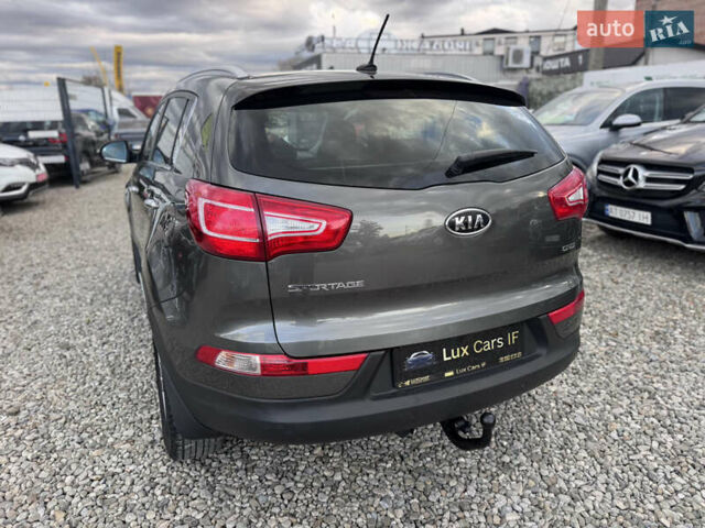 Коричневий Кіа Sportage, об'ємом двигуна 2 л та пробігом 190 тис. км за 13950 $, фото 12 на Automoto.ua