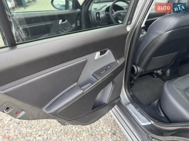 Коричневий Кіа Sportage, об'ємом двигуна 2 л та пробігом 190 тис. км за 13950 $, фото 46 на Automoto.ua