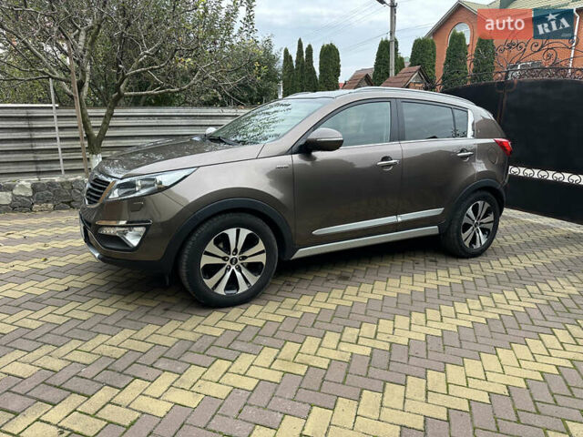 Коричневий Кіа Sportage, об'ємом двигуна 2 л та пробігом 197 тис. км за 14800 $, фото 8 на Automoto.ua