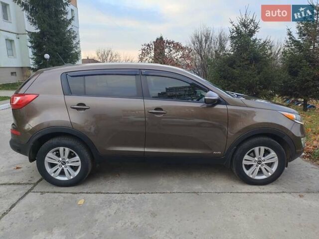 Коричневый Киа Sportage, объемом двигателя 2.4 л и пробегом 164 тыс. км за 11750 $, фото 25 на Automoto.ua