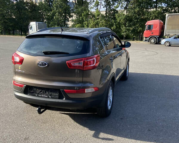 Коричневий Кіа Sportage, об'ємом двигуна 2 л та пробігом 173 тис. км за 11666 $, фото 7 на Automoto.ua