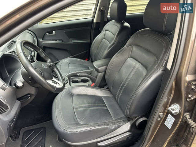 Коричневий Кіа Sportage, об'ємом двигуна 2 л та пробігом 197 тис. км за 14800 $, фото 14 на Automoto.ua
