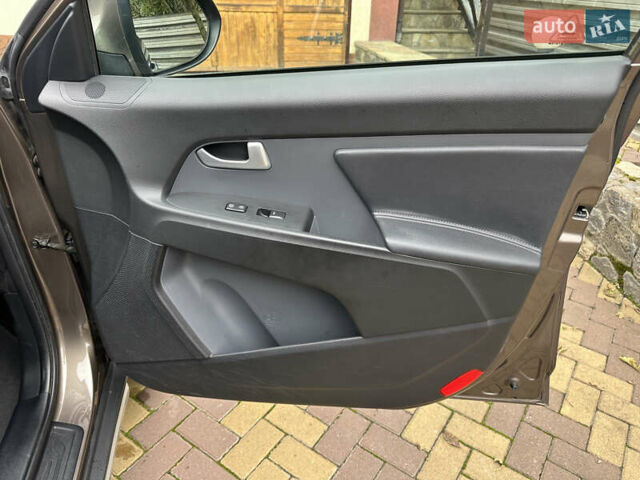 Коричневий Кіа Sportage, об'ємом двигуна 2 л та пробігом 197 тис. км за 14800 $, фото 22 на Automoto.ua