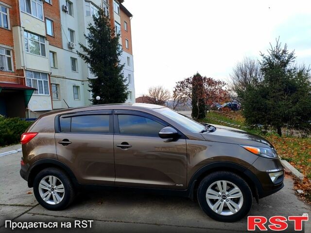Коричневий Кіа Sportage, об'ємом двигуна 2.4 л та пробігом 160 тис. км за 11650 $, фото 13 на Automoto.ua