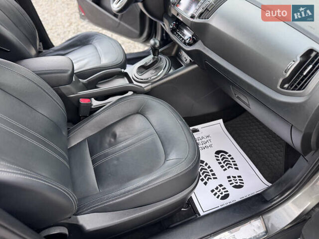 Коричневий Кіа Sportage, об'ємом двигуна 2 л та пробігом 190 тис. км за 13950 $, фото 60 на Automoto.ua