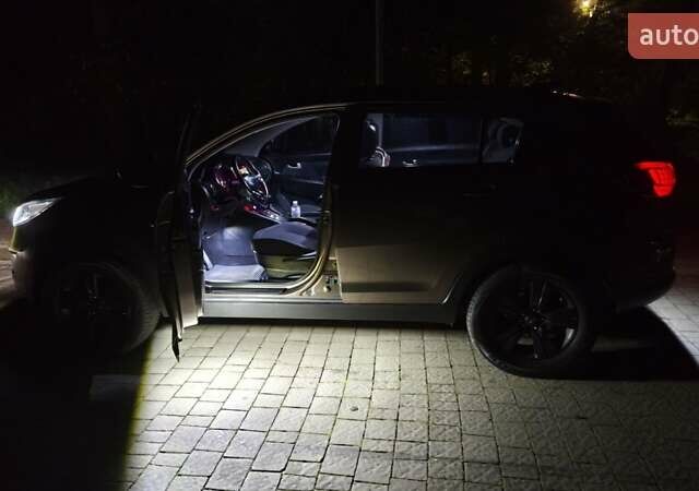 Коричневый Киа Sportage, объемом двигателя 2 л и пробегом 150 тыс. км за 16500 $, фото 16 на Automoto.ua
