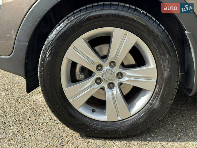 Коричневый Киа Sportage, объемом двигателя 1.69 л и пробегом 145 тыс. км за 12900 $, фото 9 на Automoto.ua