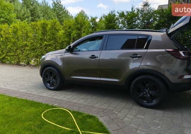 Коричневый Киа Sportage, объемом двигателя 2 л и пробегом 150 тыс. км за 16500 $, фото 18 на Automoto.ua