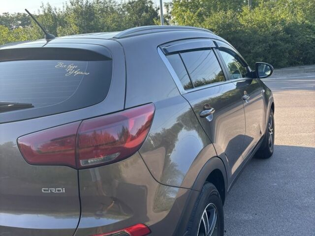 Коричневый Киа Sportage, объемом двигателя 1.7 л и пробегом 283 тыс. км за 13200 $, фото 2 на Automoto.ua