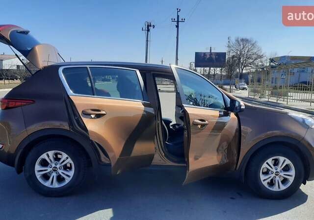 Коричневий Кіа Sportage, об'ємом двигуна 2 л та пробігом 108 тис. км за 16600 $, фото 17 на Automoto.ua