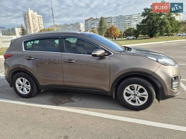 Коричневый Киа Sportage, объемом двигателя 1.69 л и пробегом 206 тыс. км за 17500 $, фото 2 на Automoto.ua