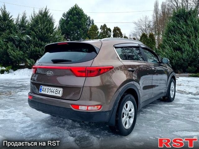 Коричневий Кіа Sportage, об'ємом двигуна 2 л та пробігом 126 тис. км за 17800 $, фото 5 на Automoto.ua