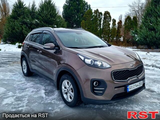 Коричневий Кіа Sportage, об'ємом двигуна 2 л та пробігом 126 тис. км за 17800 $, фото 7 на Automoto.ua