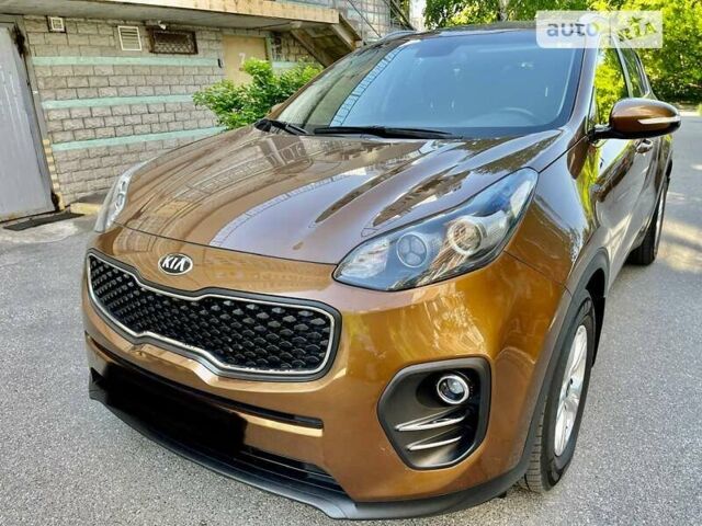 Коричневий Кіа Sportage, об'ємом двигуна 2 л та пробігом 75 тис. км за 16999 $, фото 5 на Automoto.ua