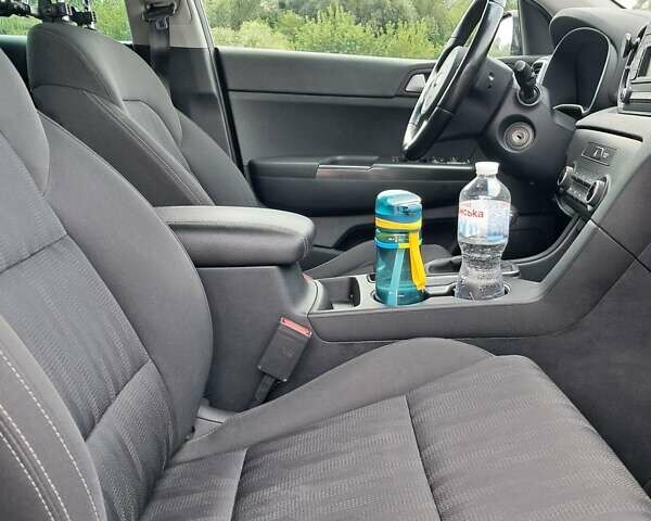 Коричневий Кіа Sportage, об'ємом двигуна 2 л та пробігом 108 тис. км за 16600 $, фото 10 на Automoto.ua