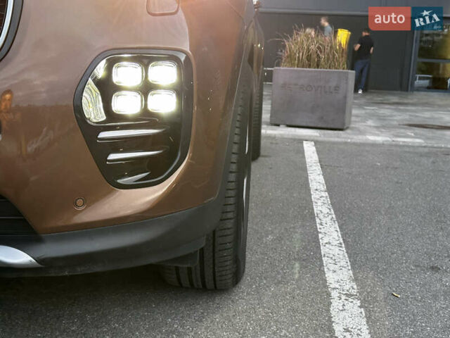 Коричневый Киа Sportage, объемом двигателя 2 л и пробегом 126 тыс. км за 20000 $, фото 12 на Automoto.ua