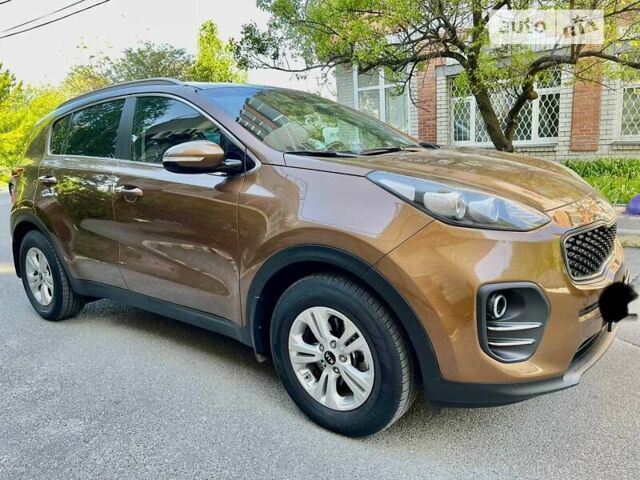 Коричневий Кіа Sportage, об'ємом двигуна 2 л та пробігом 75 тис. км за 16999 $, фото 16 на Automoto.ua