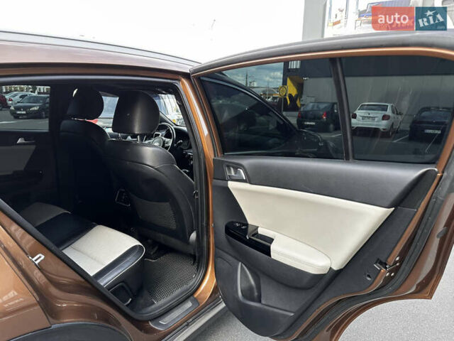Коричневый Киа Sportage, объемом двигателя 2 л и пробегом 126 тыс. км за 20000 $, фото 35 на Automoto.ua