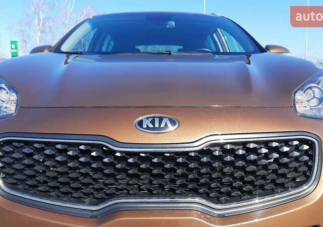 Коричневий Кіа Sportage, об'ємом двигуна 2 л та пробігом 108 тис. км за 16600 $, фото 22 на Automoto.ua