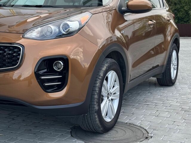 Коричневый Киа Sportage, объемом двигателя 2.4 л и пробегом 70 тыс. км за 15900 $, фото 7 на Automoto.ua