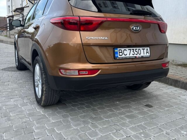 Коричневый Киа Sportage, объемом двигателя 2.4 л и пробегом 70 тыс. км за 15900 $, фото 2 на Automoto.ua