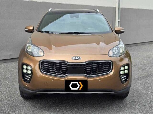 Коричневый Киа Sportage, объемом двигателя 2 л и пробегом 43 тыс. км за 3500 $, фото 5 на Automoto.ua