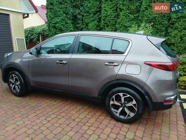 Коричневий Кіа Sportage, об'ємом двигуна 1.59 л та пробігом 96 тис. км за 16000 $, фото 5 на Automoto.ua