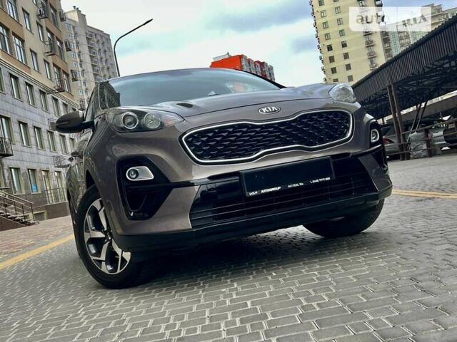 Коричневий Кіа Sportage, об'ємом двигуна 1.59 л та пробігом 88 тис. км за 18800 $, фото 76 на Automoto.ua