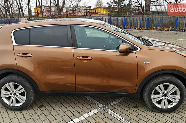 Коричневий Кіа Sportage, об'ємом двигуна 2.36 л та пробігом 113 тис. км за 14400 $, фото 11 на Automoto.ua