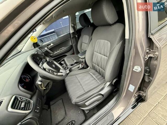 Коричневий Кіа Sportage, об'ємом двигуна 1.59 л та пробігом 53 тис. км за 13900 $, фото 31 на Automoto.ua