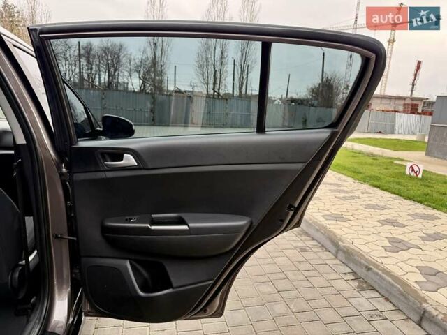 Коричневий Кіа Sportage, об'ємом двигуна 1.59 л та пробігом 53 тис. км за 13900 $, фото 52 на Automoto.ua