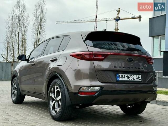Коричневий Кіа Sportage, об'ємом двигуна 1.59 л та пробігом 53 тис. км за 13900 $, фото 5 на Automoto.ua