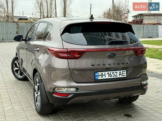 Коричневий Кіа Sportage, об'ємом двигуна 1.59 л та пробігом 53 тис. км за 13900 $, фото 25 на Automoto.ua