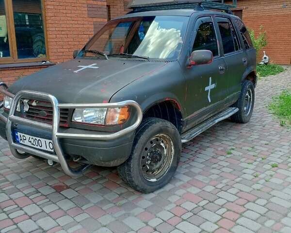 Красный Киа Sportage, объемом двигателя 2 л и пробегом 309 тыс. км за 3300 $, фото 1 на Automoto.ua