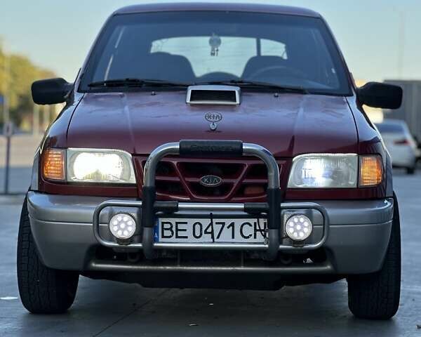 Красный Киа Sportage, объемом двигателя 2 л и пробегом 350 тыс. км за 2999 $, фото 5 на Automoto.ua