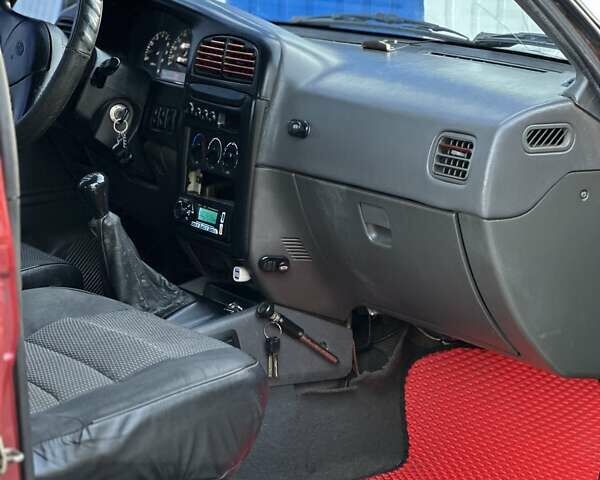 Красный Киа Sportage, объемом двигателя 2 л и пробегом 350 тыс. км за 2999 $, фото 10 на Automoto.ua