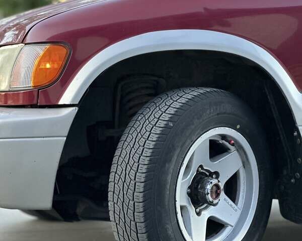 Красный Киа Sportage, объемом двигателя 2 л и пробегом 350 тыс. км за 2999 $, фото 7 на Automoto.ua