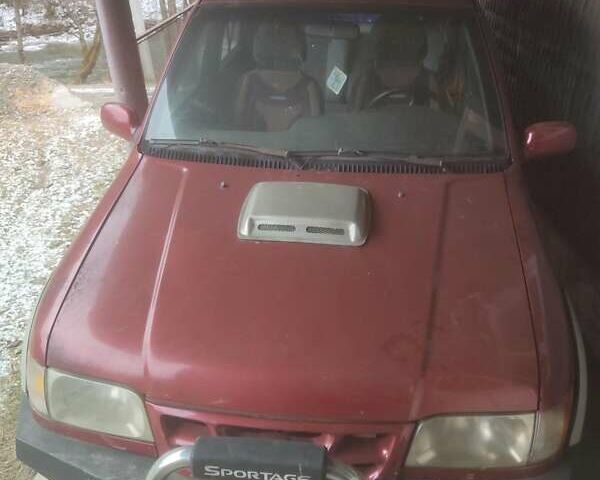 Красный Киа Sportage, объемом двигателя 2 л и пробегом 260 тыс. км за 3200 $, фото 5 на Automoto.ua