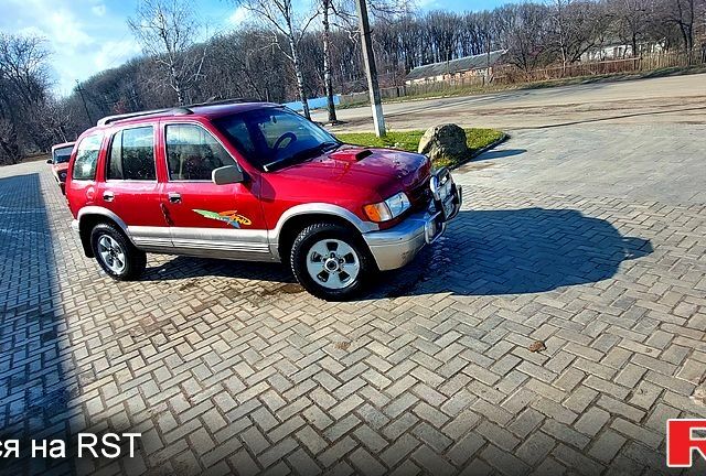 Червоний Кіа Sportage, об'ємом двигуна 2 л та пробігом 370 тис. км за 3500 $, фото 1 на Automoto.ua