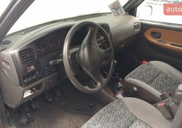 Красный Киа Sportage, объемом двигателя 2 л и пробегом 260 тыс. км за 3200 $, фото 3 на Automoto.ua