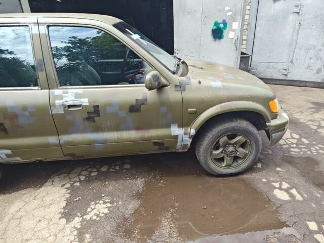 Красный Киа Sportage, объемом двигателя 2 л и пробегом 200 тыс. км за 1500 $, фото 2 на Automoto.ua