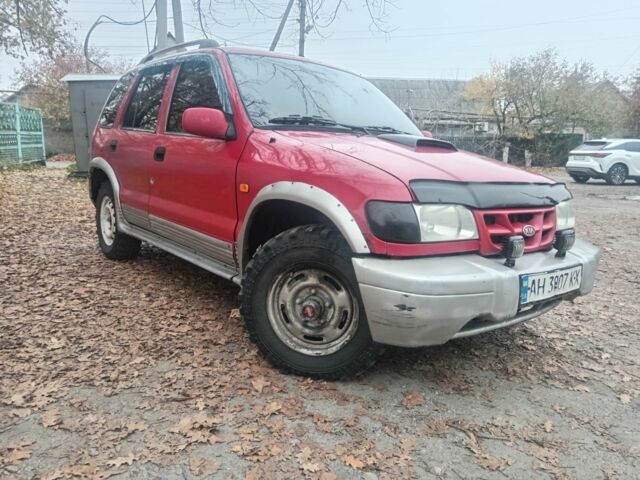Червоний Кіа Sportage, об'ємом двигуна 2 л та пробігом 200 тис. км за 1310 $, фото 1 на Automoto.ua