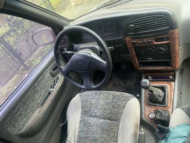 Червоний Кіа Sportage, об'ємом двигуна 2 л та пробігом 2 тис. км за 2700 $, фото 4 на Automoto.ua