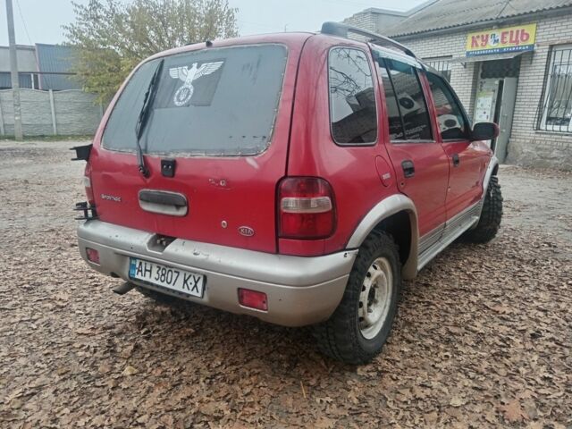 Червоний Кіа Sportage, об'ємом двигуна 2 л та пробігом 200 тис. км за 1310 $, фото 2 на Automoto.ua