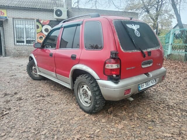 Червоний Кіа Sportage, об'ємом двигуна 2 л та пробігом 200 тис. км за 1310 $, фото 3 на Automoto.ua