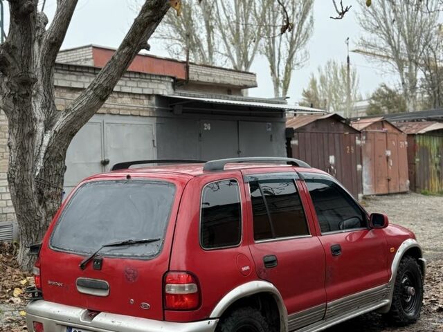 Красный Киа Sportage, объемом двигателя 2 л и пробегом 200 тыс. км за 1000 $, фото 5 на Automoto.ua