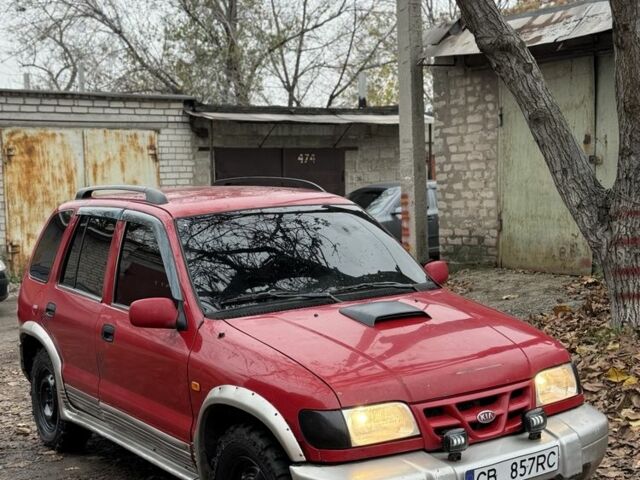 Красный Киа Sportage, объемом двигателя 2 л и пробегом 200 тыс. км за 1000 $, фото 2 на Automoto.ua