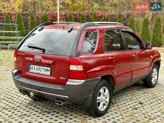 Красный Киа Sportage, объемом двигателя 2.66 л и пробегом 275 тыс. км за 7500 $, фото 12 на Automoto.ua
